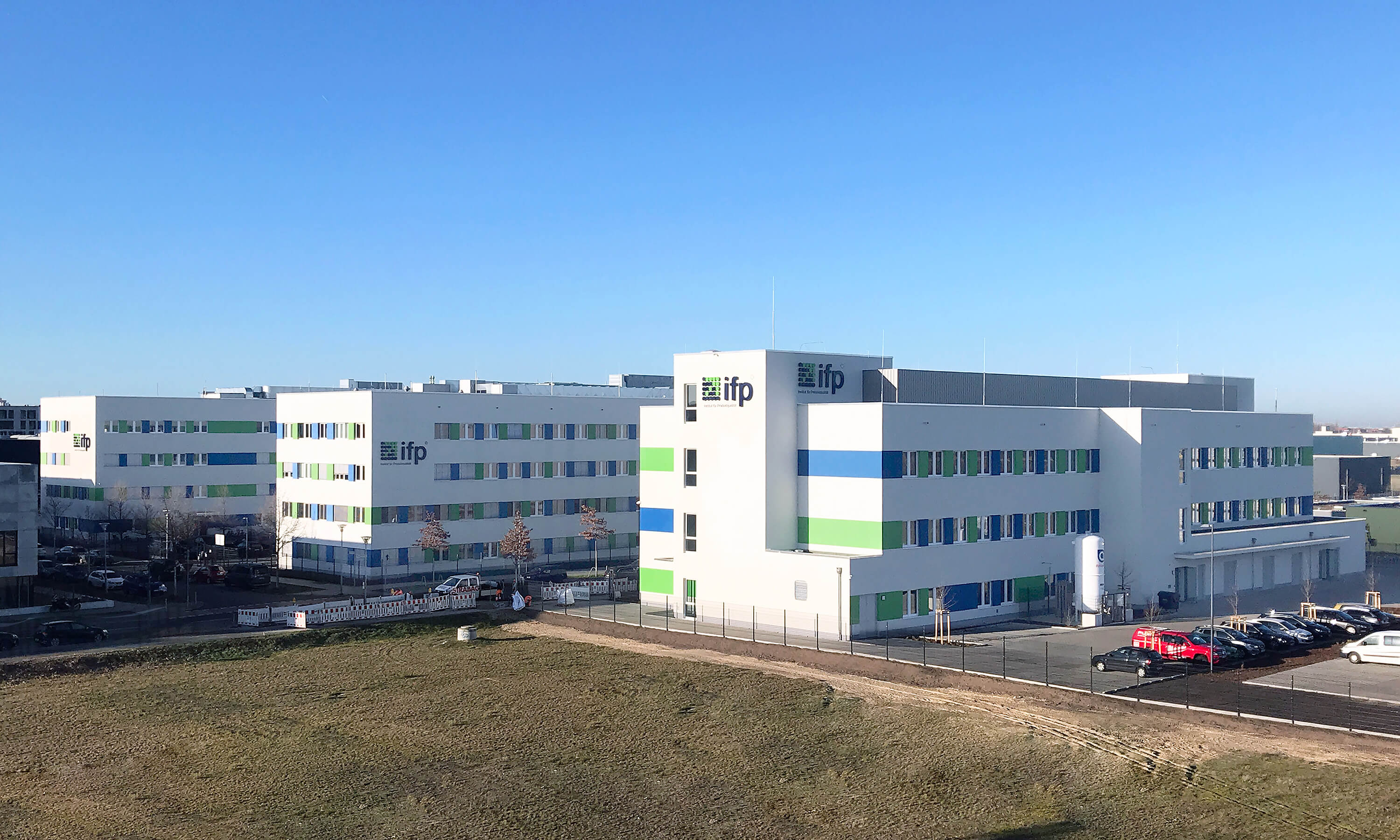 Exterior view of the ifp laboratory building on a clear day.