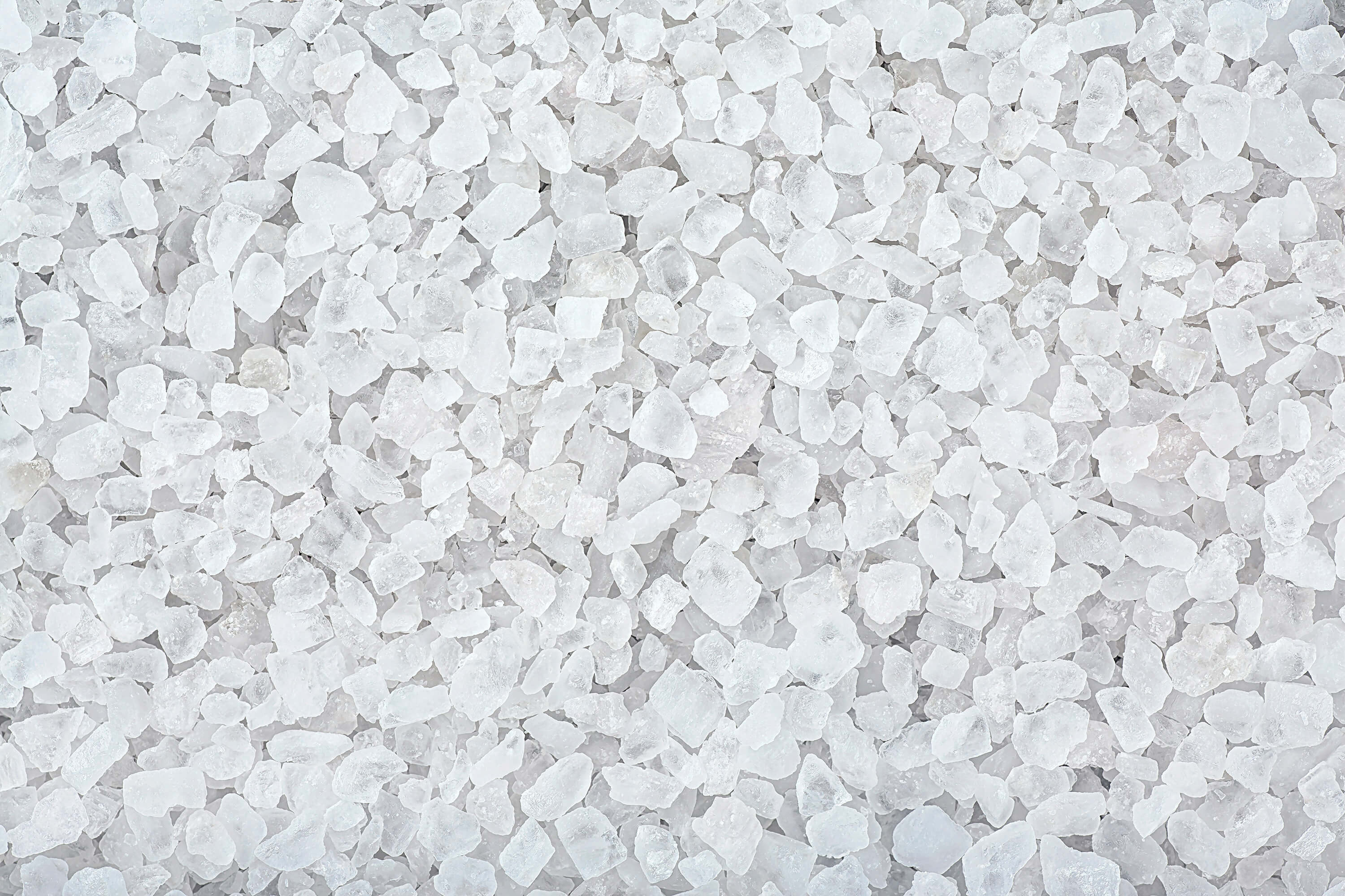 Coarse sea salt texture background.