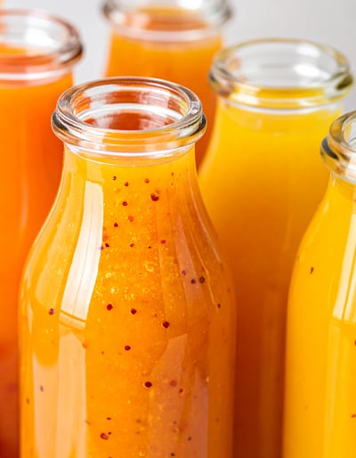 Beverage samples used for spoilage organism testing and product stability assessment.