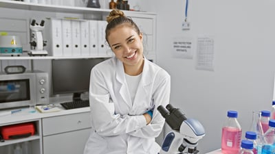 Scientist in a modern laboratory, conveying confidence and professional expertise.